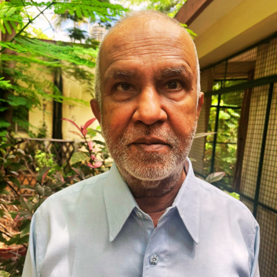 A portrait photo of ADD India's founder Sri B Venkatesh