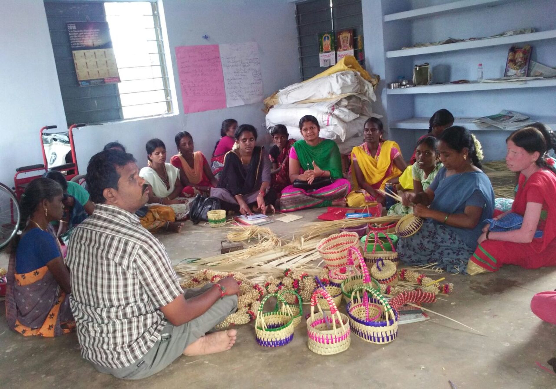 People handcrafting buckets